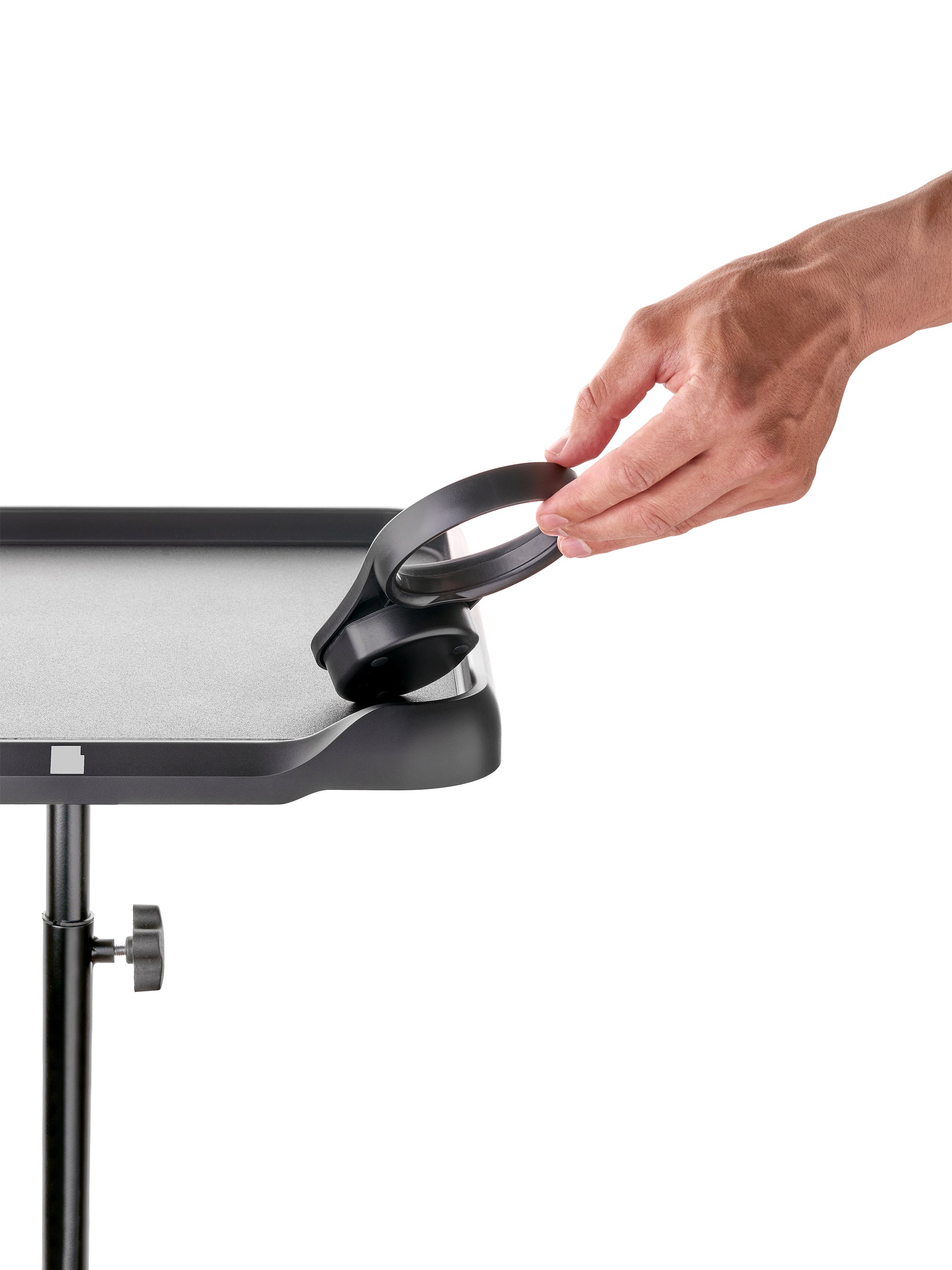 Classic Black holder being attached to the LEVSHAassistant Set C rolling color tray – assistant holder for a traditional professional hair dryer.